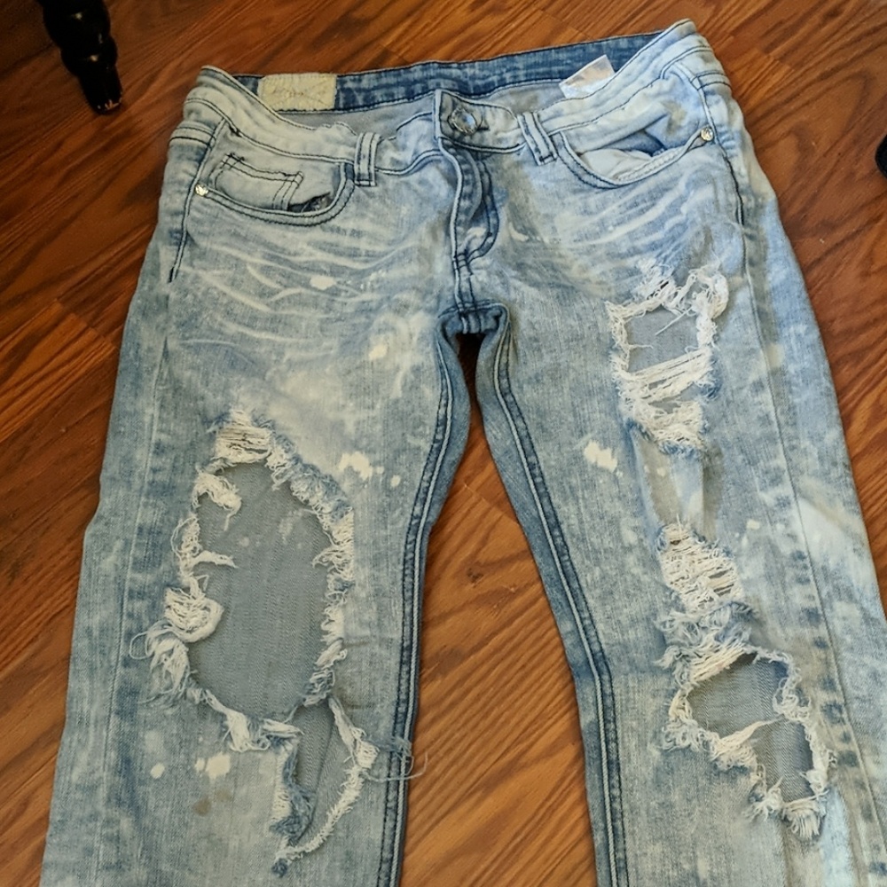 Acid wash distressed jeans